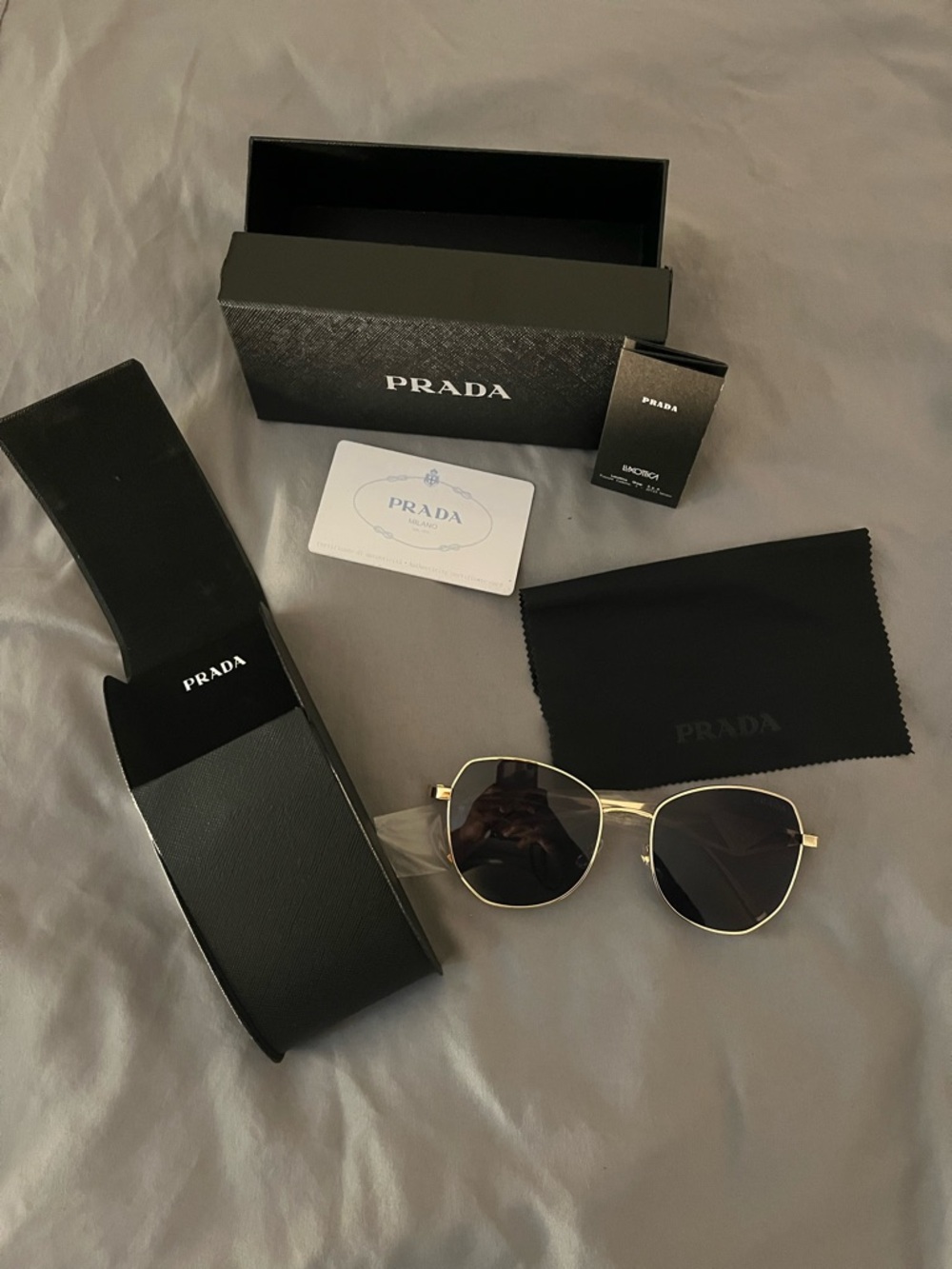 Prada Gold Metal Sunglasses with Dark Lenses